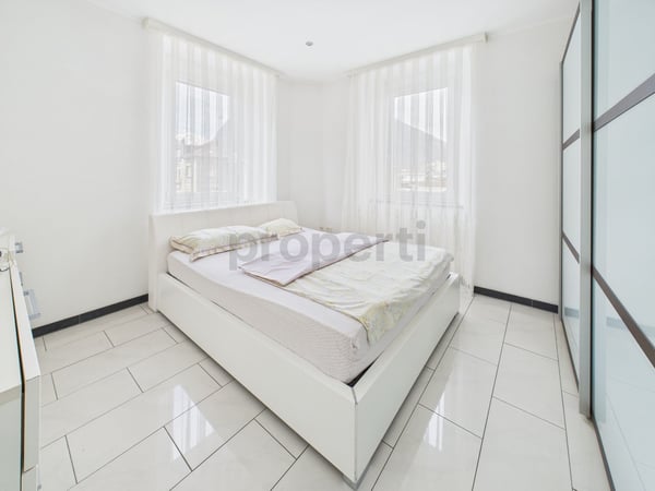 Elegante casa plurifamiliare di 2.5 Locali con tre appartamenti e Giardino a Biasca 5