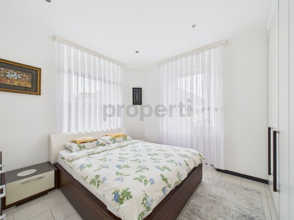 Elegante casa plurifamiliare di 2.5 Locali con tre appartamenti e Giardino a Biasca 6