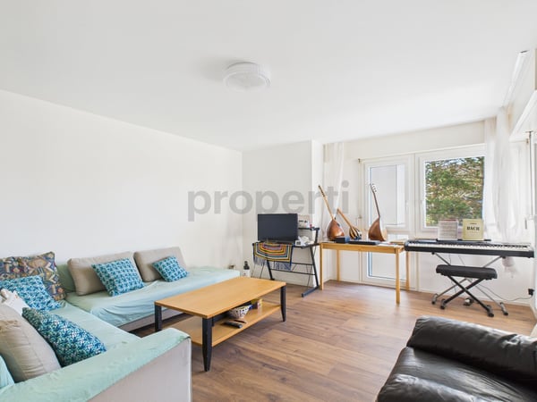 Lichtdurchflutete 1.5-Zimmer-Wohnung in Fribourg mit Balkon 1