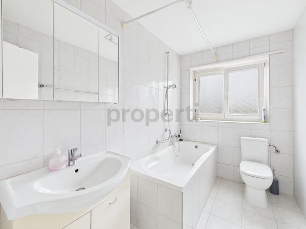 Gepflegtes Mehrfamilienhaus in ruhiger Lage in Full-Reuenthal 7