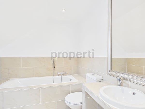 Maison jumelée rénovée de 1.5 pièces avec jardin, véranda et grand salon  cadre familial calme à Le Mont-sur-Lausanne 9