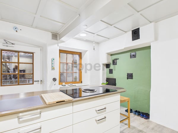 Charmante 1.5-Zimmer-Maisonette-Wohnung im historischen Zehntenhaus  Wo Geschichte auf modernen Wohnkomfort trifft 2