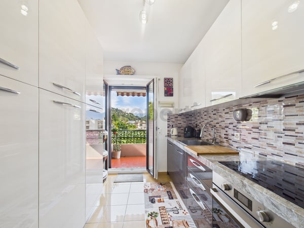 Attico ristrutturato 1.5 locali con vista lago a Caslano 4