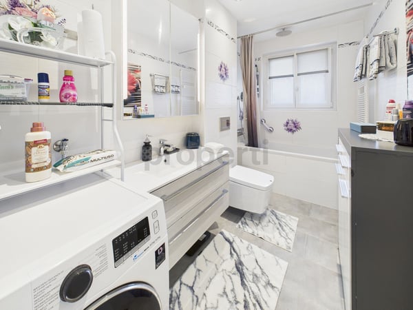 Attico ristrutturato 1.5 locali con vista lago a Caslano 8