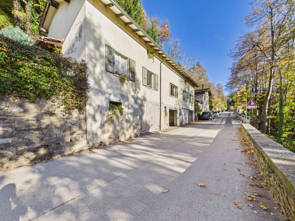 Affascinante casa unifamiliare di 1.5 immersa nel verde ad Aranno 5