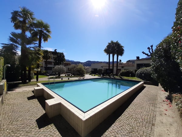 Attraktive 1.5-Zimmer-Wohnung mit Balkon in AgnoAttraente appartamento di 1.5 locali con balcone ad Agno 1