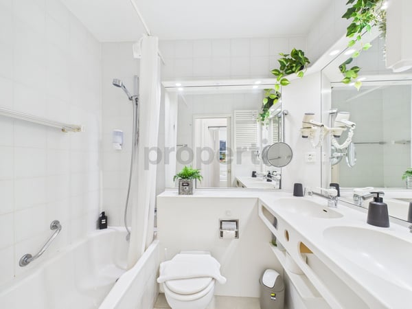 Appartamento 1.5 locali con vista lago e piscina condominiale  ideale come residenza primaria, secondaria o investimento per affitti brevi! 7