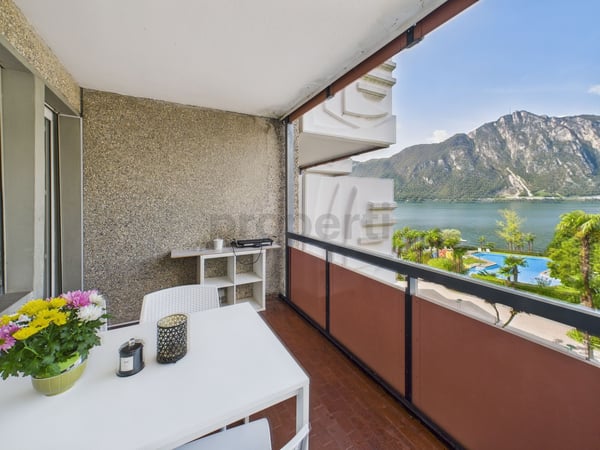 Appartamento 1.5 locali con vista lago e piscina condominiale  ideale come residenza primaria, secondaria o investimento per affitti brevi! 9