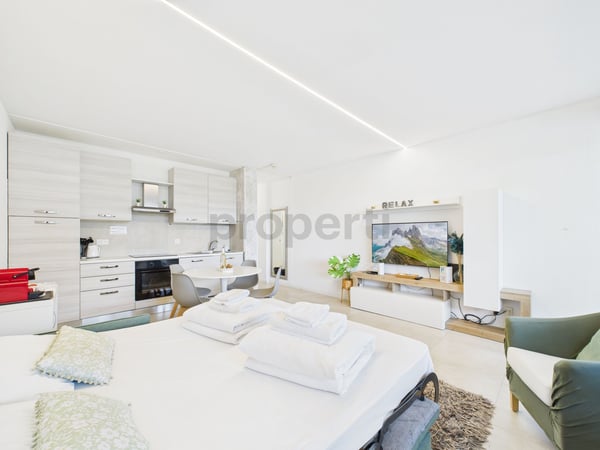 Appartamento 1.5 locali con vista lago e piscina condominiale  ideale come residenza primaria, secondaria o investimento per affitti brevi! 4