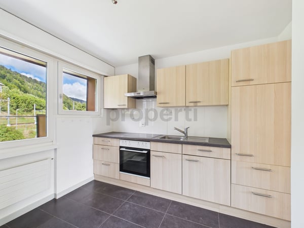 Appartement exclusif à Renan, BE - Un foyer harmonieux dans un cadre rural 2