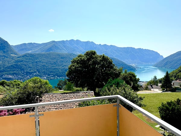 Elegante Attico di 3,5 Locali con Vista sul Lago di Lugano 10