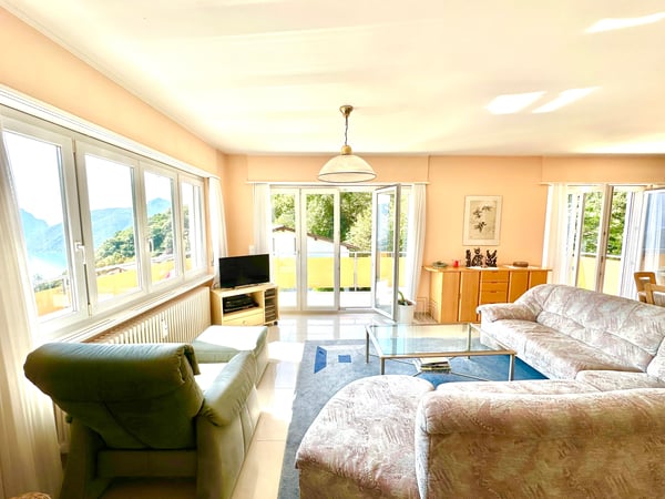 Elegante Attico di 3,5 Locali con Vista sul Lago di Lugano 2