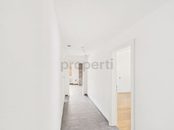 Moderne 4.5-Zimmer-Wohnung mit Balkon und Kamin in Mels 5