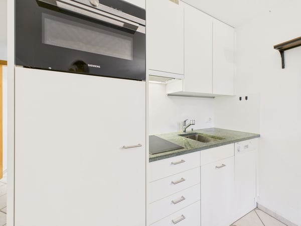 Wohnen mit Aussicht - charmante 2.5-Zimmer-Zweitwohnung mit grossem Gartensitzplatz und Bergblick in Laax-Dorf 5