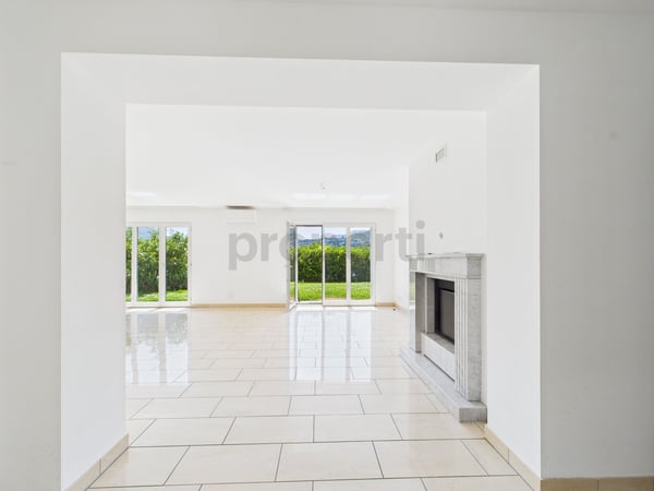 Luminoso appartamento da 4.5 locali con giardino a Morcote 1