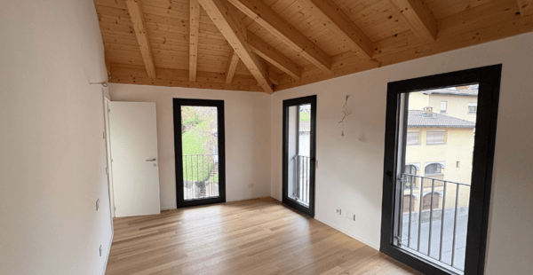 Attico Esclusivo con Vista Lago a Pura - Comfort Moderno in Posizione Idilliaca 4