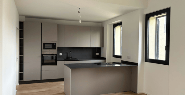 Moderno Appartamento di 3.5 Locali al Piano Terra con Vista Lago a Pura - Comfort in Posizione Tranquilla 1