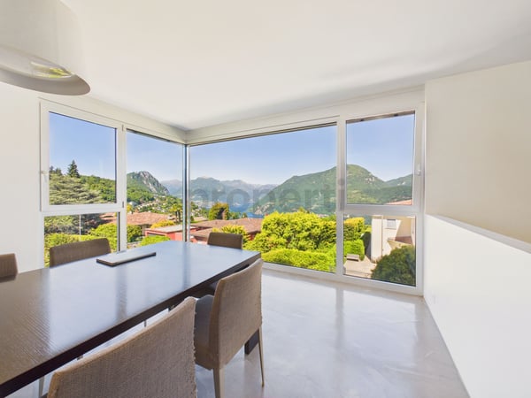 Elegante villa moderna con giardino e vista panoramica sul lago a Carona. 5