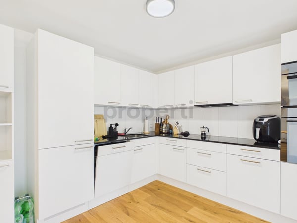 Renovierte 3.5-Zimmer-Wohnung mit privatem Gartensitzplatz und moderner Ausstattung 4