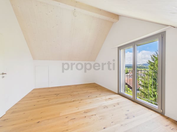 Stilvolles Neubau-Einfamilienhaus in nachhaltiger Holzbauweise mit Naturgarten und Alpenblick 10