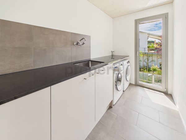 Stilvolles Neubau-Einfamilienhaus in nachhaltiger Holzbauweise mit Naturgarten und Alpenblick 5
