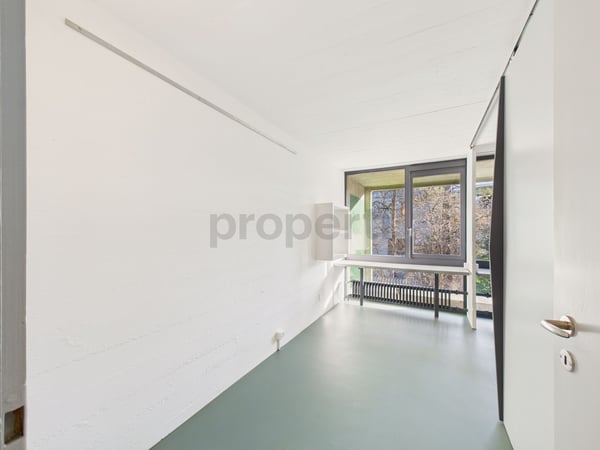 Wohnen in einer Ikone der Schweizer Architektur | Einzigartige 3.5-Zimmer-Wohnung im denkmalgeschützten Atelier-5-Ensemble in Flamatt 5