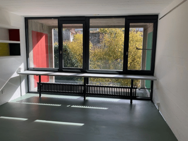 Wohnen in einer Ikone der Schweizer Architektur | Einzigartige 3.5-Zimmer-Wohnung im denkmalgeschützten Atelier-5-Ensemble in Flamatt 12