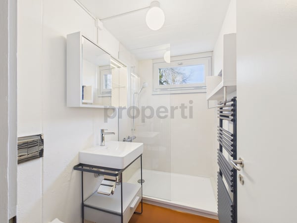 Wohnen in einer Ikone der Schweizer Architektur | Einzigartige 4.5-Zimmer-Maisonettewohnung im denkmalgeschützten Atelier-5-Ensemble in Flamatt 6
