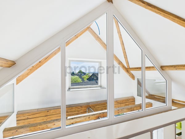 2.5 Zimmer Wohnung - ein einzigartiges Zuhause, das Geschichte und Moderne vereint 9
