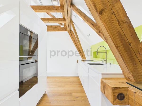 2.5 Zimmer Wohnung - ein einzigartiges Zuhause, das Geschichte und Moderne vereint 6
