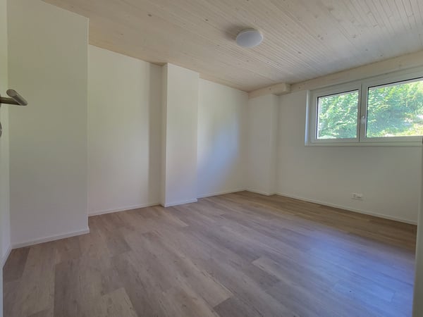 Hohe Decken im Wohnzimmer, modernes Dachgeschoss in 2024 renoviert und stilvoller Ausbau 7