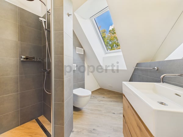 Attikawohnung direkt am Waldrand mit Zürichseeblick, Minergie-Standard und Free-Cooling 10