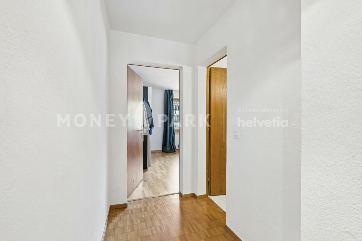 Appartement attractif de 2,5 pièces avec cheminée et balcon