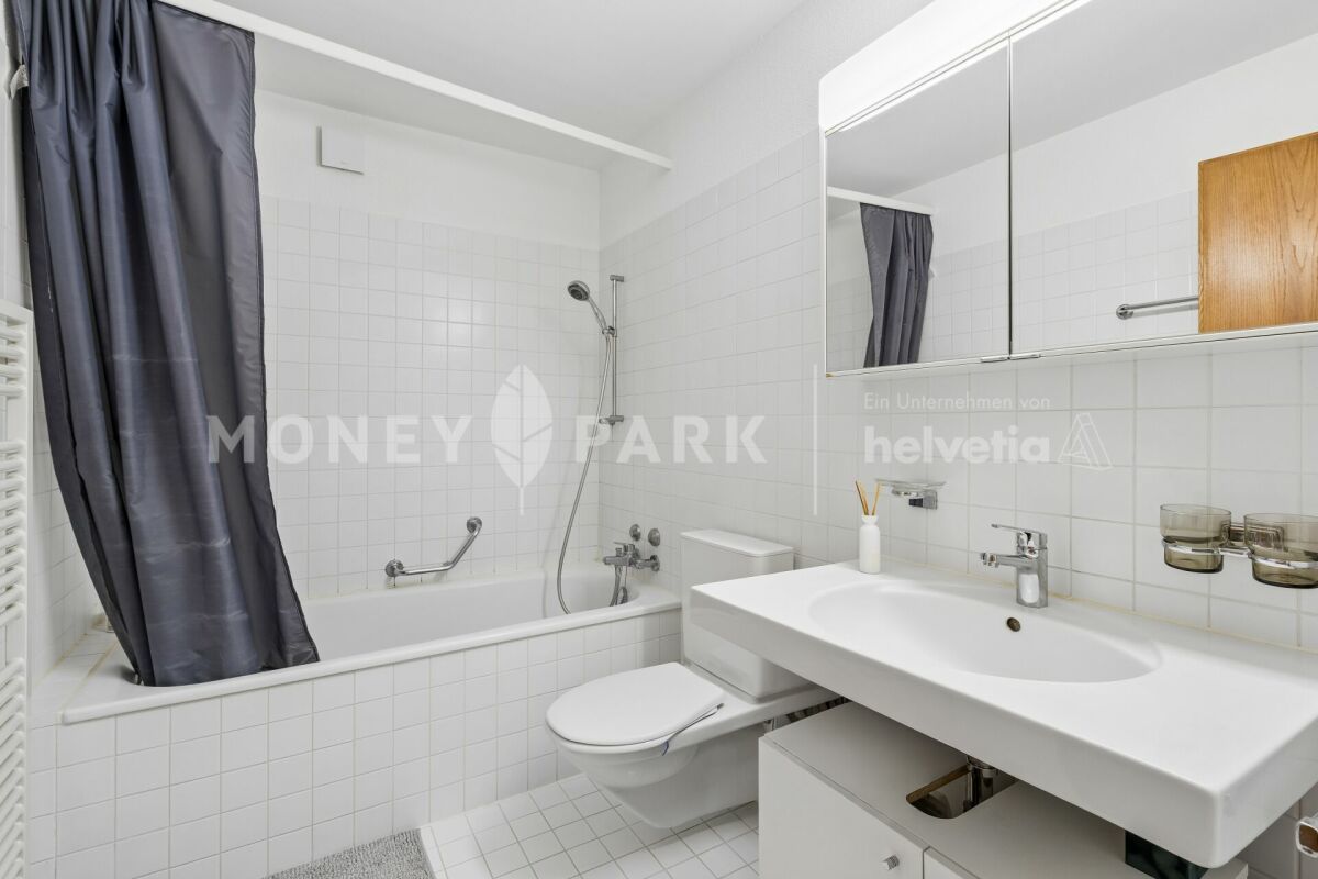 Appartement attractif de 2,5 pièces avec cheminée et balcon