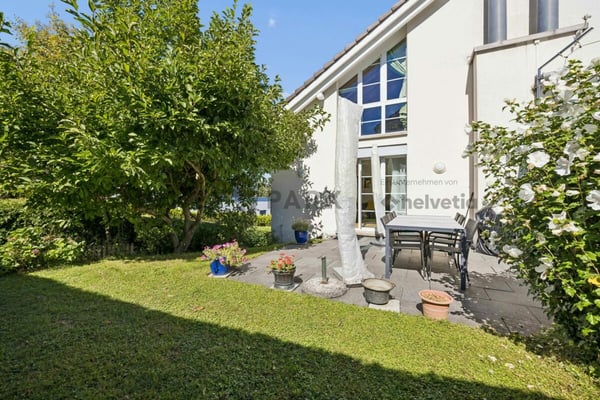 6.5-Zimmer-Doppelhaushälfte mit Garten 10