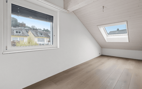Erstbezug: exklusive Attika-Wohnung mit riesigem Balkon und Cheminée 4