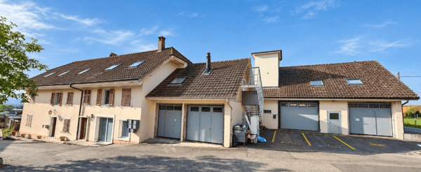 Mehrfamilienhaus mit Werkstatt in Bellach: 4 Wohnungen im Stockwerkeigentum 1