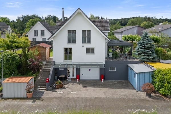 Einfamilienhaus mit gepflegtem Garten und einzigartiger Garage 12