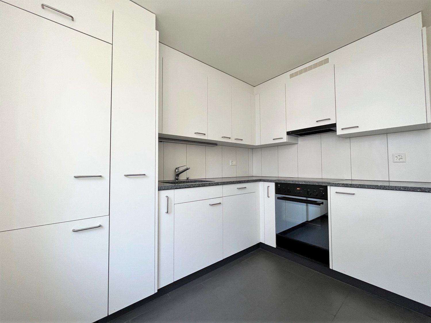modern kitchen, fully equipped, modern appliances, white cabinets, gray countertops, open shelves