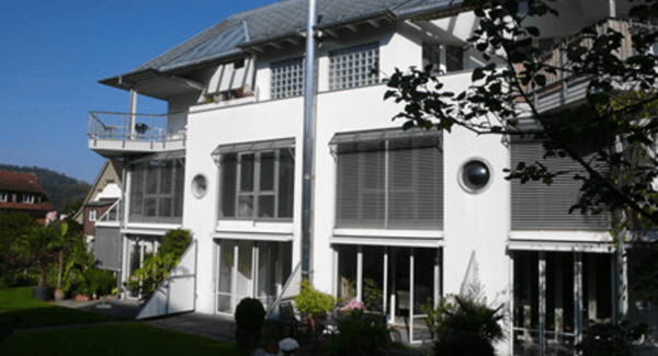 Sonnige 4.5 Zimmer-Maisonette-Wohnung in Gartenebene und 1. OG mit Wintergarten 1