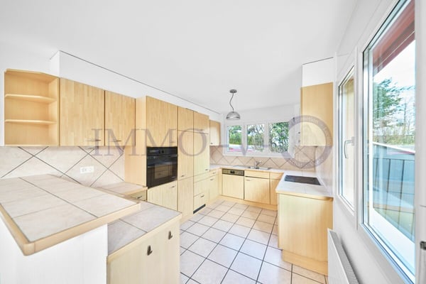 SPACIEUSE AVEC GRAND JARDIN AU CALME 5