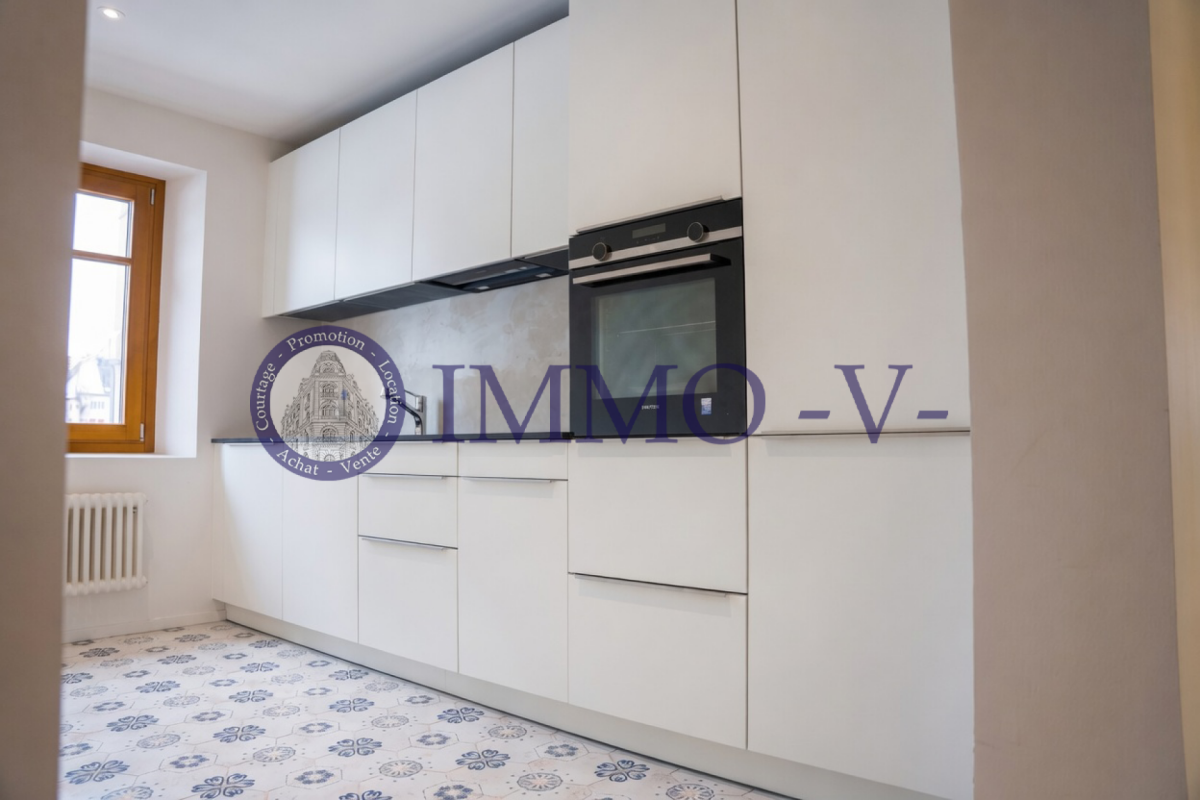 Cachet et élégance au centre-ville - appartement rénové avec caractère