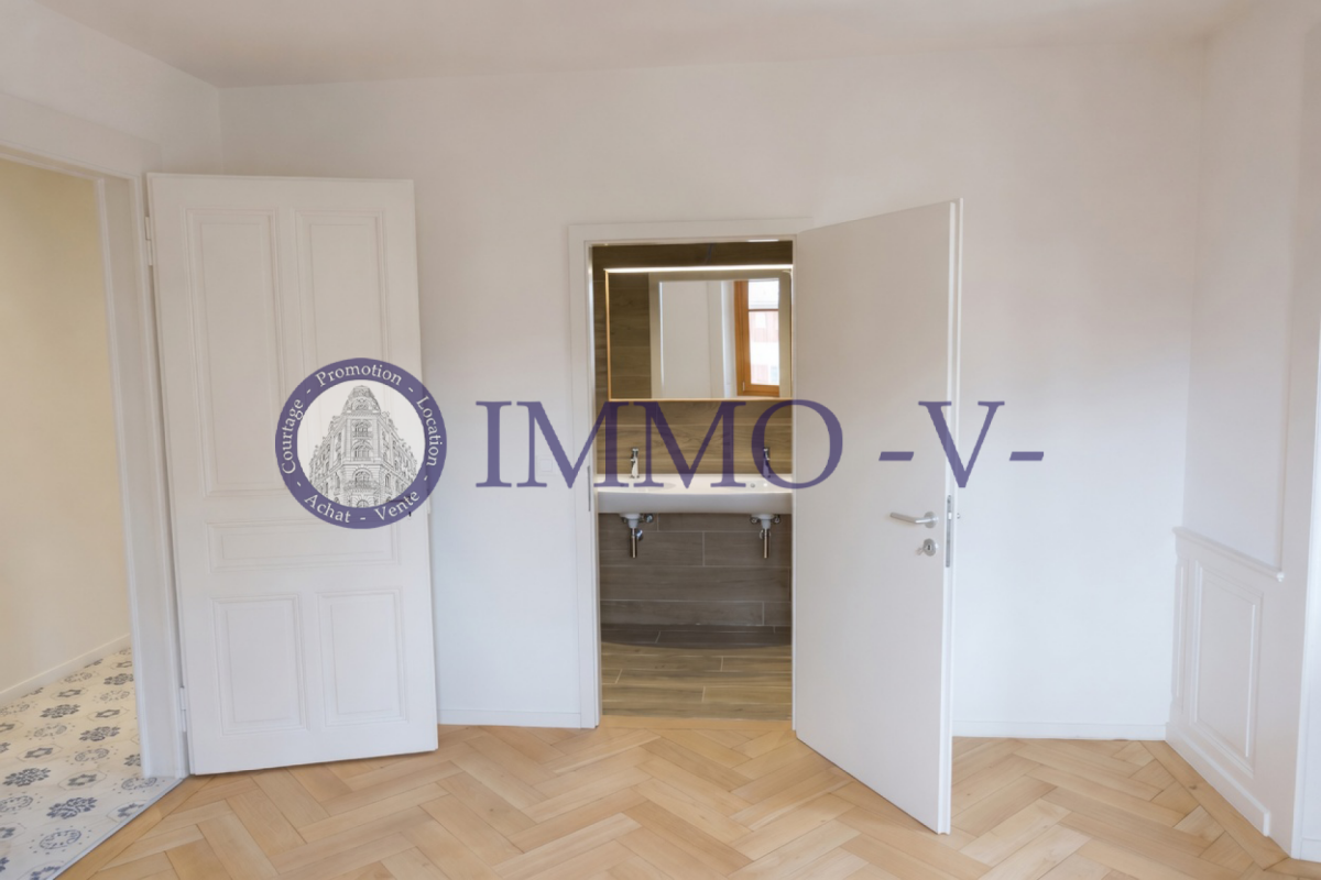 Cachet et élégance au centre-ville - appartement rénové avec caractère